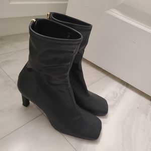 black heeled leather boots